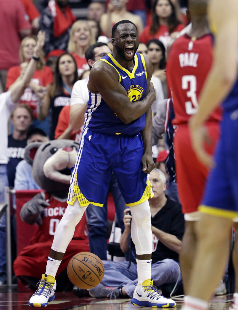 Golden State Warriors forward Draymond Green (23) reacts after a play during the second half in ...