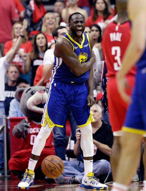 Golden State Warriors forward Draymond Green (23) reacts after a play during the second half in ...