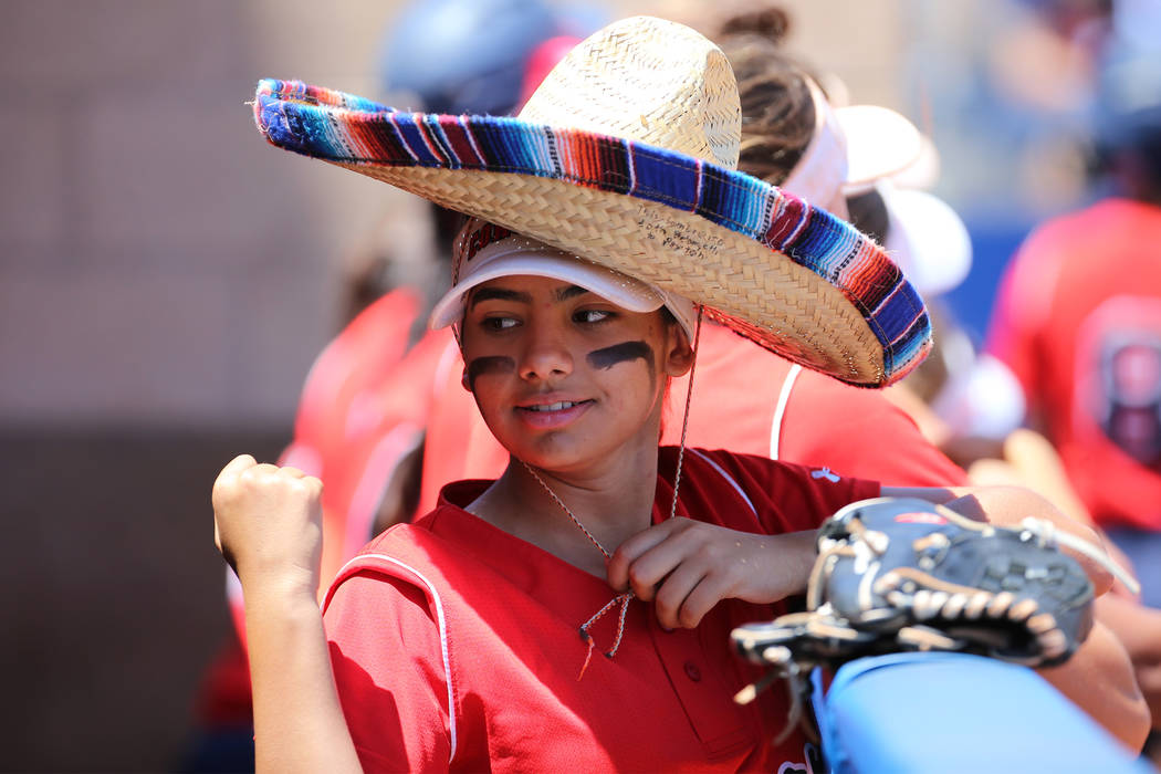 Coronado's Valeria Bermudez (14) stands in the dugout wearing a sombrero during the Southern Ne ...