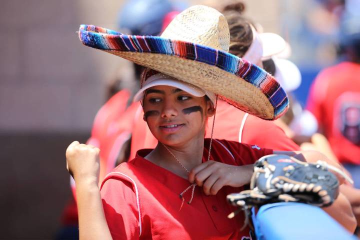 Coronado's Valeria Bermudez (14) stands in the dugout wearing a sombrero during the Southern Ne ...