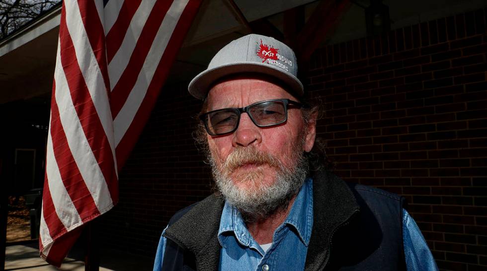 In this Friday, March 22, 2019 photo, Allan Votaw, 66, poses for a portrait outside his home in ...