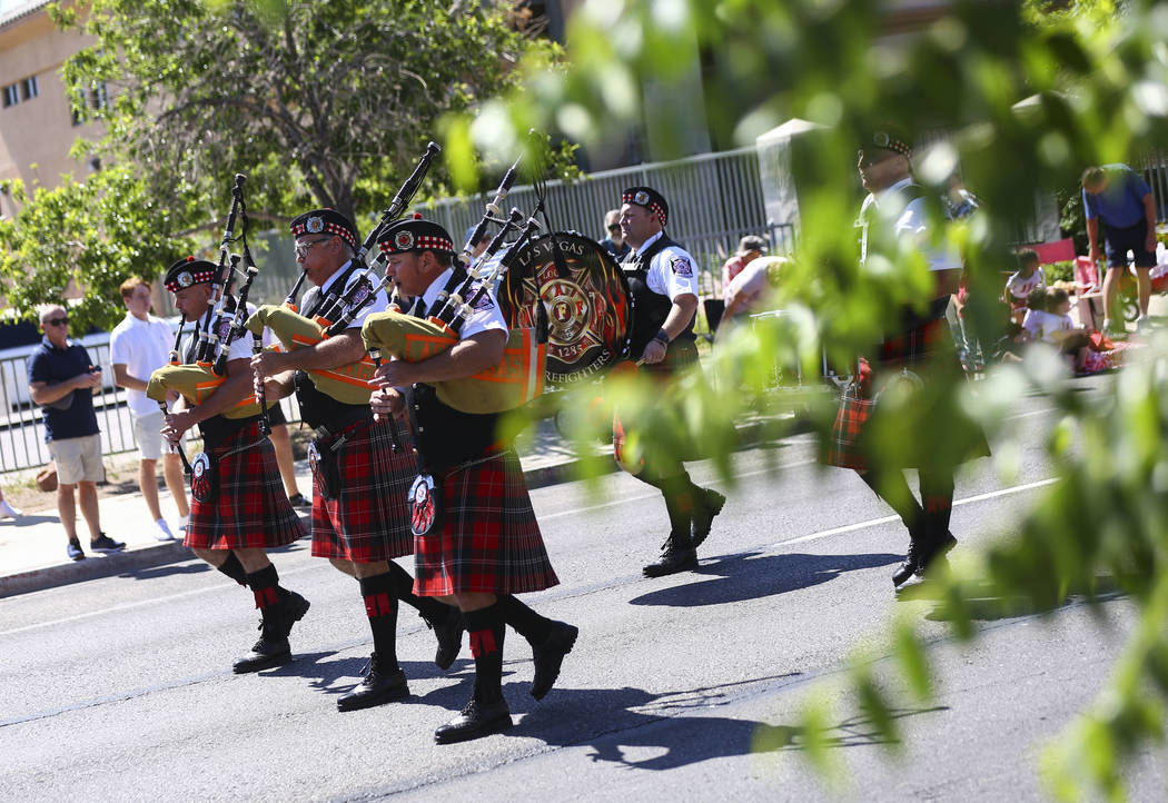Members of the Las Vegas firefighters pipe & drum band perform during the Helldorado Parade ...