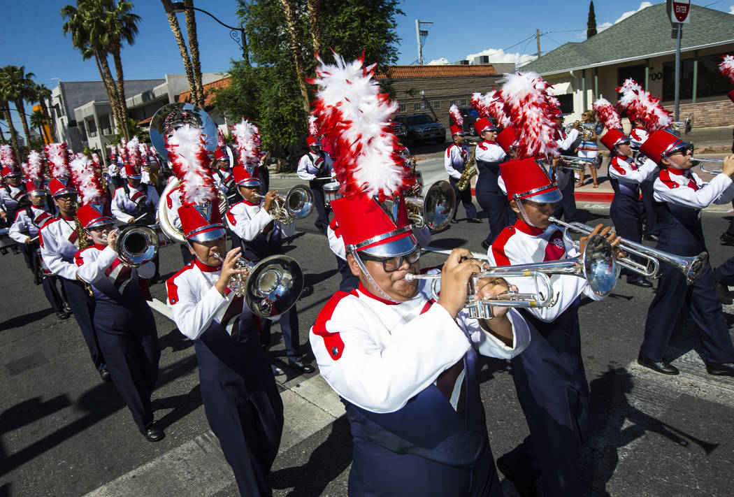 Members of the Valley High School marching band perform during the Helldorado Parade along Four ...