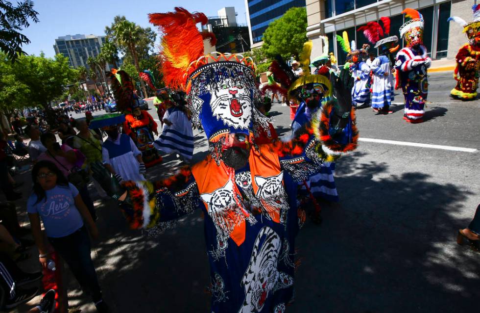 Members of Comparsa Fiesta Morelense perform during the Helldorado Parade along Fourth Street i ...