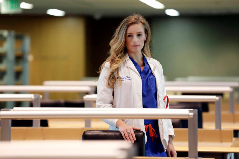 In this May 2, 2019, photo, Savanah Harshbarger, a medical student at Duke University, poses fo ...