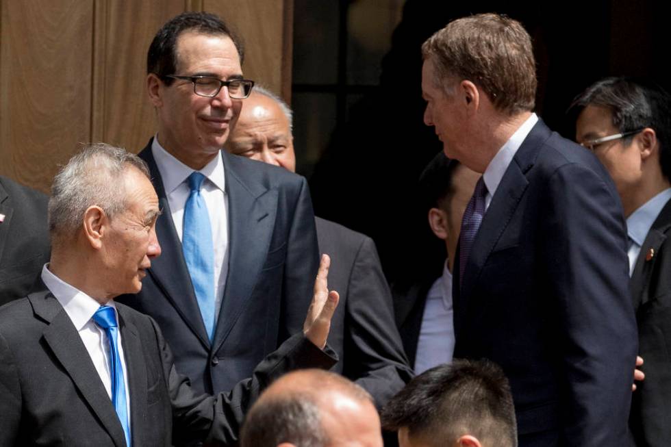 Treasury Secretary Steve Mnuchin, second from left, and United States Trade Representative Robe ...