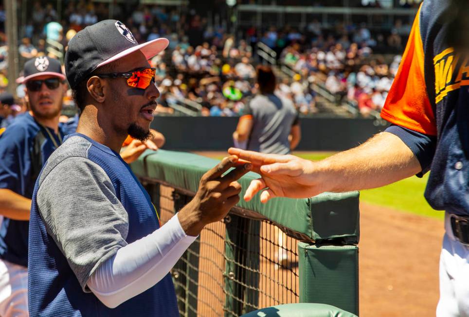 Aviators shortstop Jorge Mateo (14) encourages his teammates from the dugout as they face the T ...