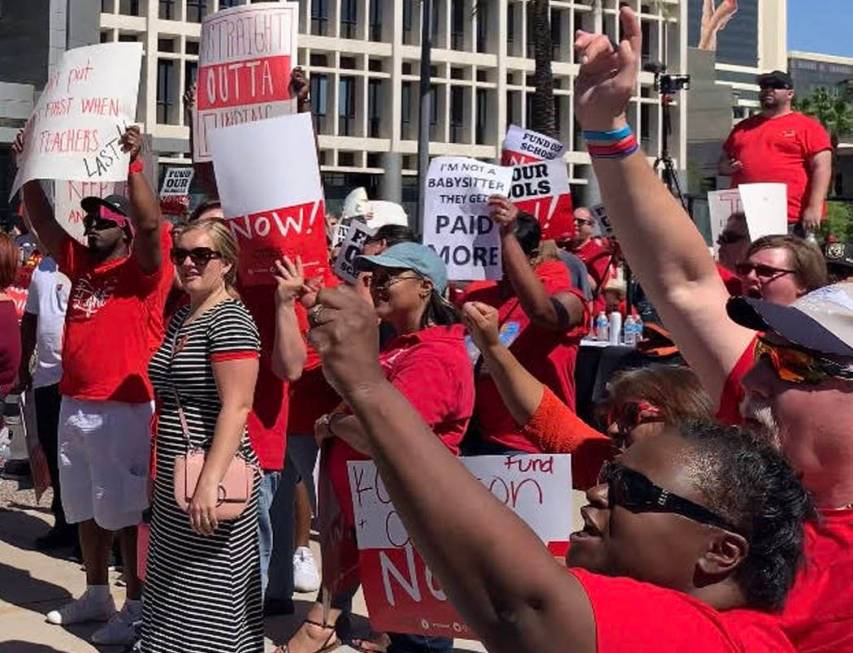 Thousands of educators, parents and students gather to rally to secure additional education fun ...