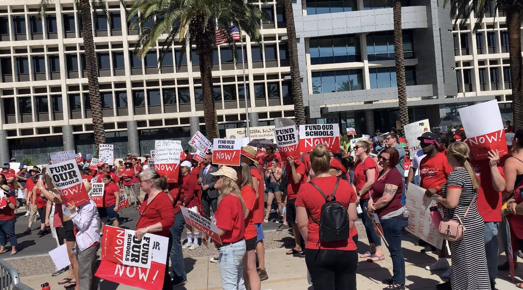 Thousands of educators, parents and students gather to rally to secure additional education fun ...