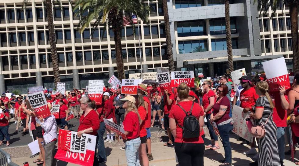 Thousands of educators, parents and students gather to rally to secure additional education fun ...