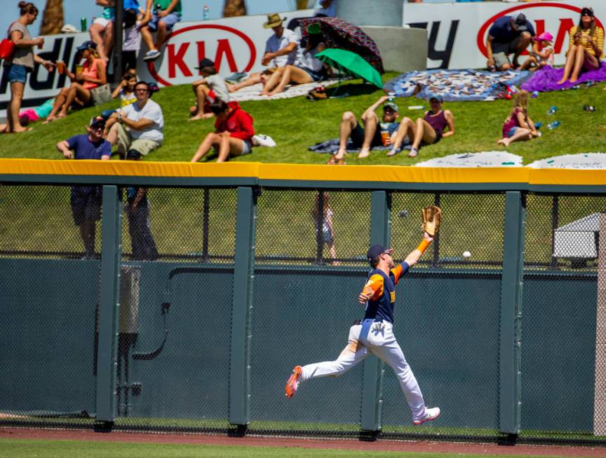 The Aviators Skye Bolt (8) misses a deep fly ball in right field hit off the wall by the Tacoma ...