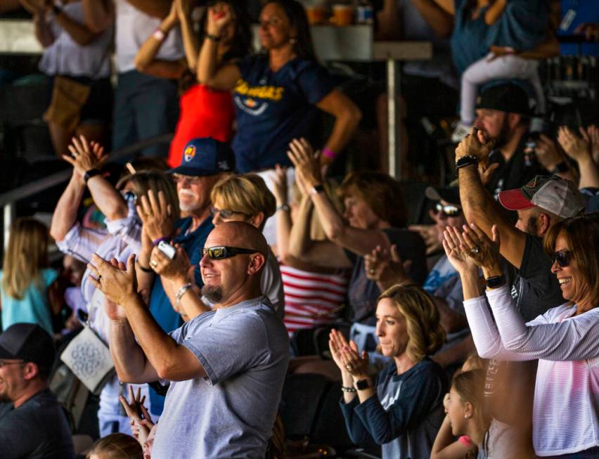 Aviators fans celebrate a grand slam late in the game versus the Tacoma Rainiers at the Las Veg ...