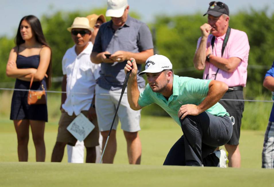 Matt Every lines up a putt on the 10th green in the final round of the Byron Nelson golf tourna ...