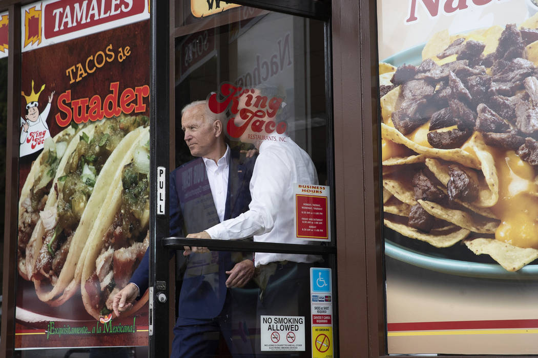 Joe Biden, left, and Los Angeles Mayor Eric Garcetti leave a Mexican restaurant after talking t ...