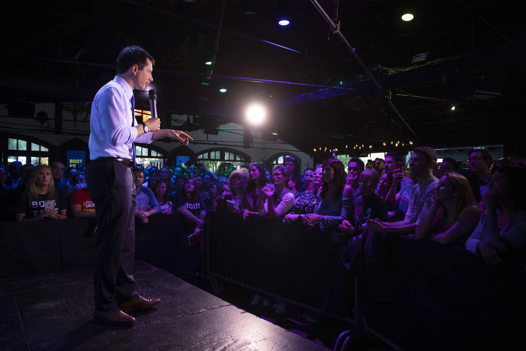 Pete Buttigieg addresses supporters at a campaign event, in West Hollywood, Calif., in May 2019 ...