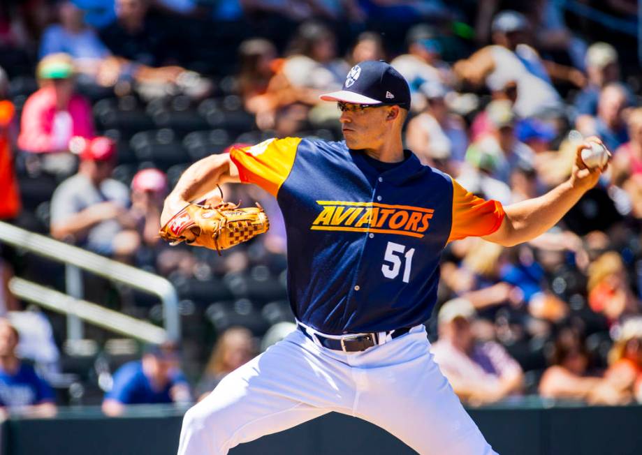 The Aviators pitcher Kyle Lobstein (51) winds up for another throw versus the Tacoma Rainiers a ...