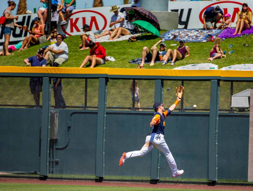 The Aviators Skye Bolt (8) misses a deep fly ball in right field hit off the wall by the Tacoma ...