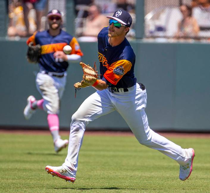 The Aviators Skye Bolt (8) readies to catch a ball short in right field hit by the Tacoma Raini ...