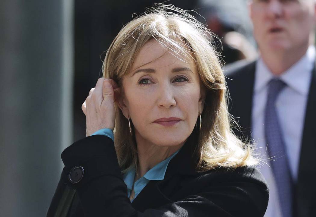 Actress Felicity Huffman arrives April 3, 2019, at federal court in Boston to face charges in a ...