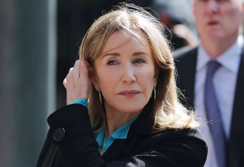 Actress Felicity Huffman arrives April 3, 2019, at federal court in Boston to face charges in a ...