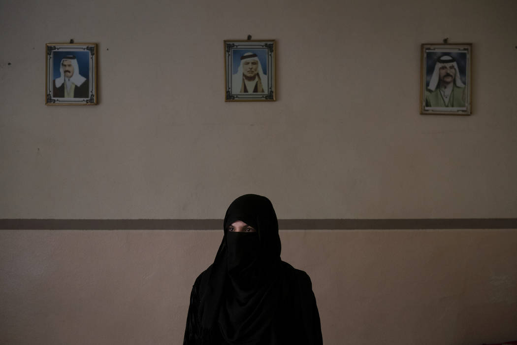 Khadija Abd poses for a portrait in her family's house in Mosul, Iraq, on April 14, 2019. On a ...