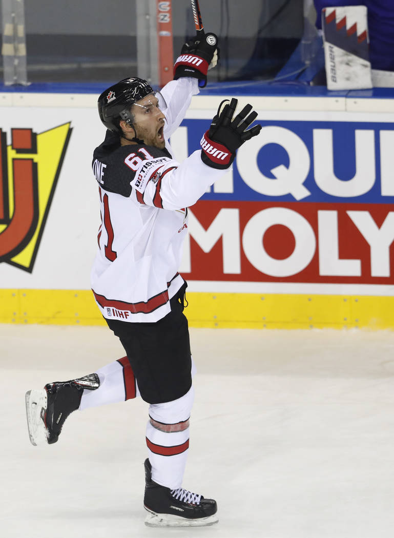 Canada's Mark Stone celebrates with after scoring his side's sixth goal during the Ice Hockey W ...