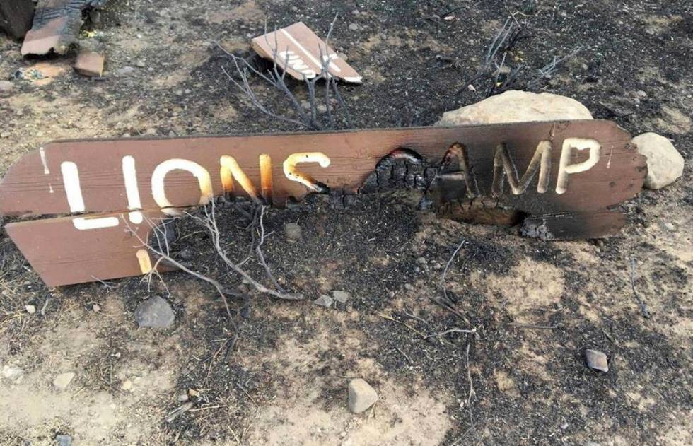 This October 2018 photo provided by the Elko Lion's Club, shows a charred sign at the Lion's Cl ...