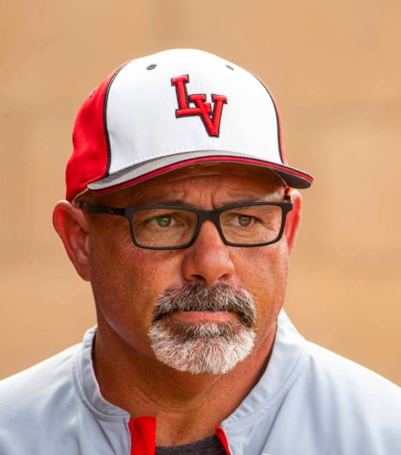 Longtime Las Vegas High coach Sam Thomas eyes his players during their state baseball tournamen ...