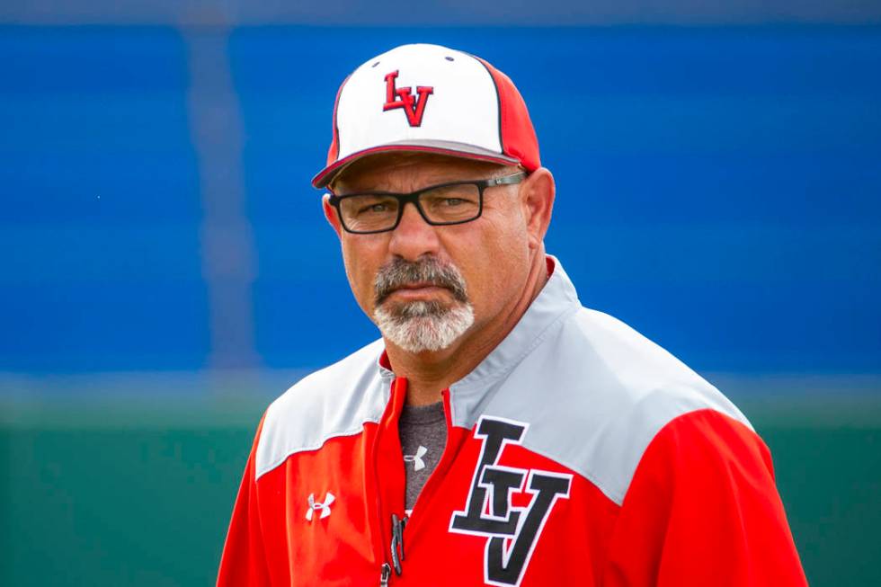 Longtime Las Vegas High coach Sam Thomas eyes his players during their state baseball tournamen ...