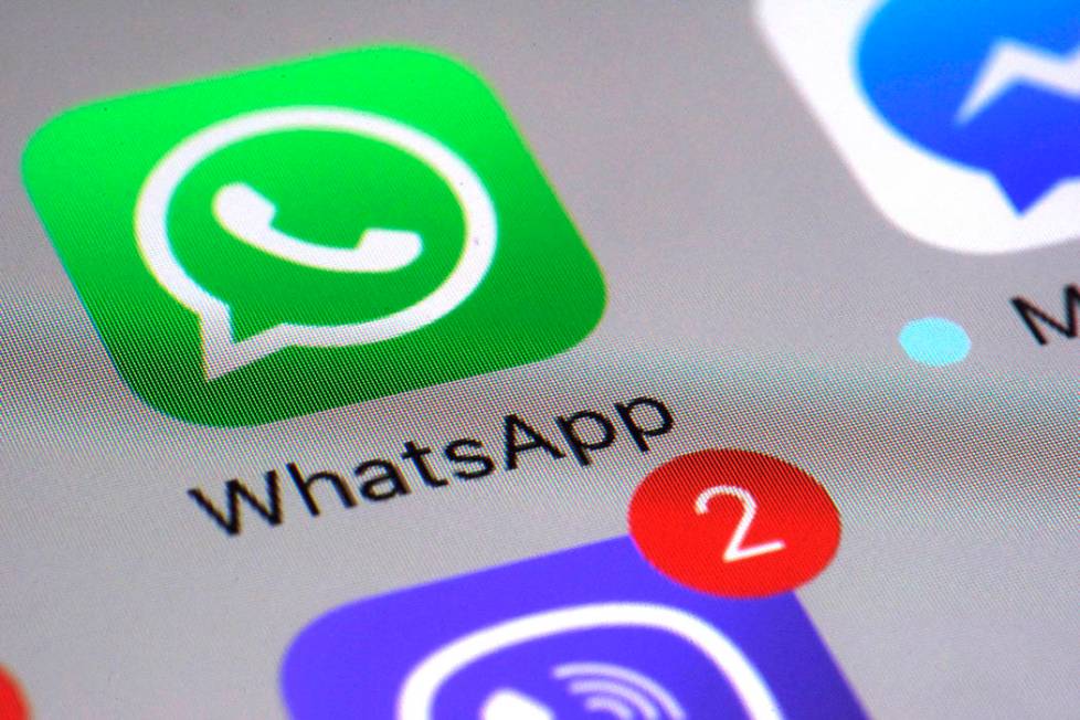 A March 10, 2017, file photo shows the WhatsApp communications app on a smartphone, in New York ...