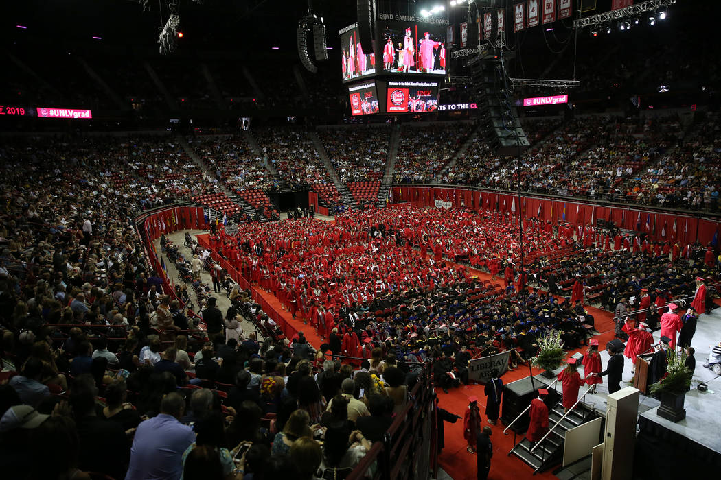 Students participate during the UNLV commencement ceremony at the Thomas & Mack Center in L ...