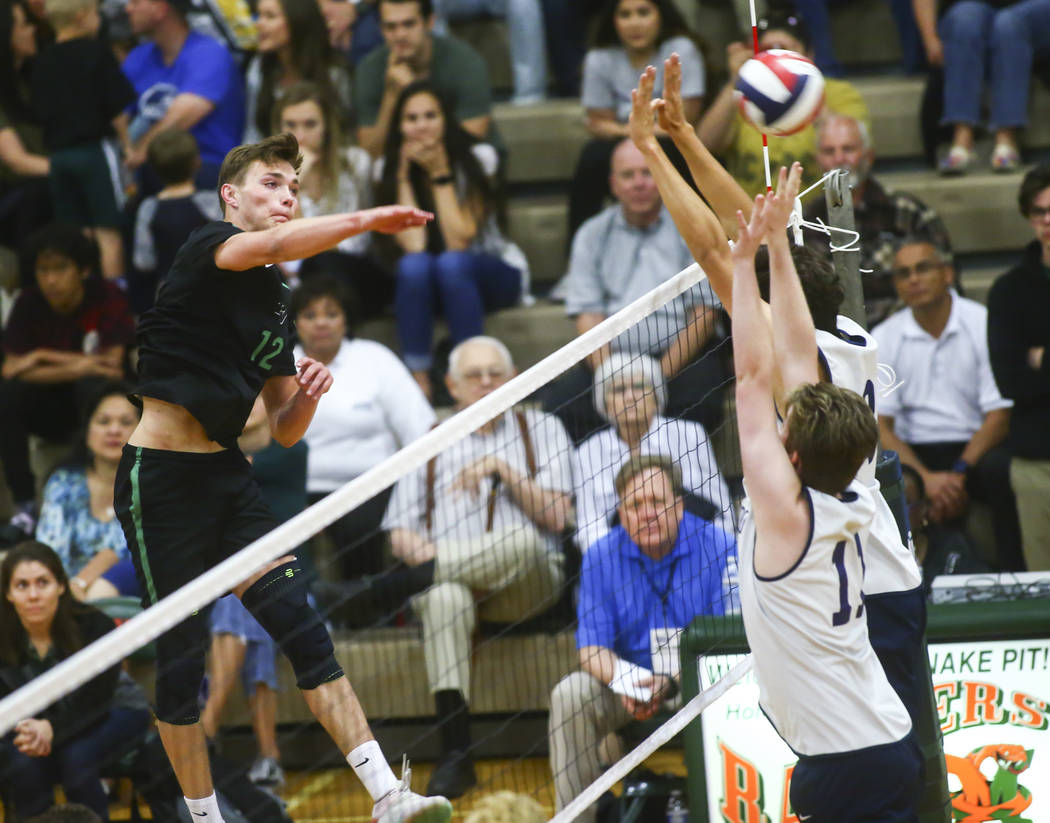 Palo Verde's Jared Brady (12) sends the ball past Coronado during the Class 4A state volleyball ...