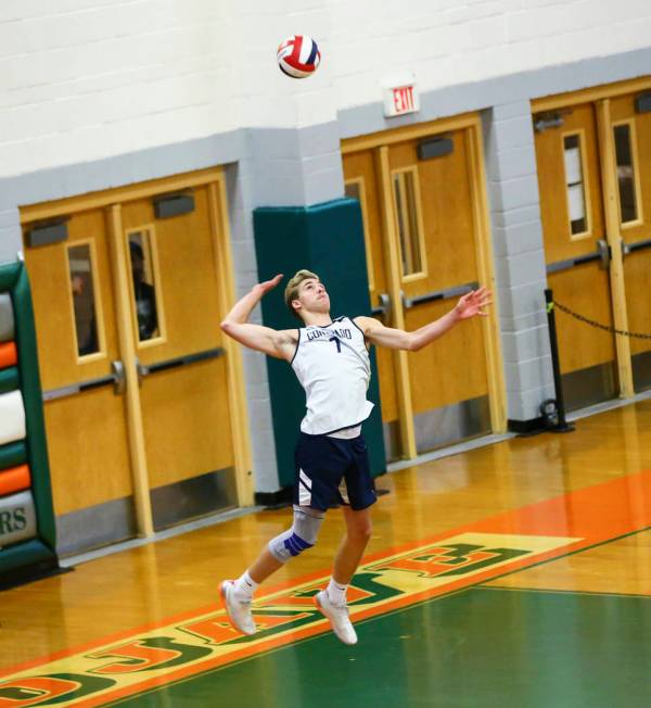 Coronado's Jacob Ceci (7) serves the ball to Palo Verde during the Class 4A state volleyball ch ...