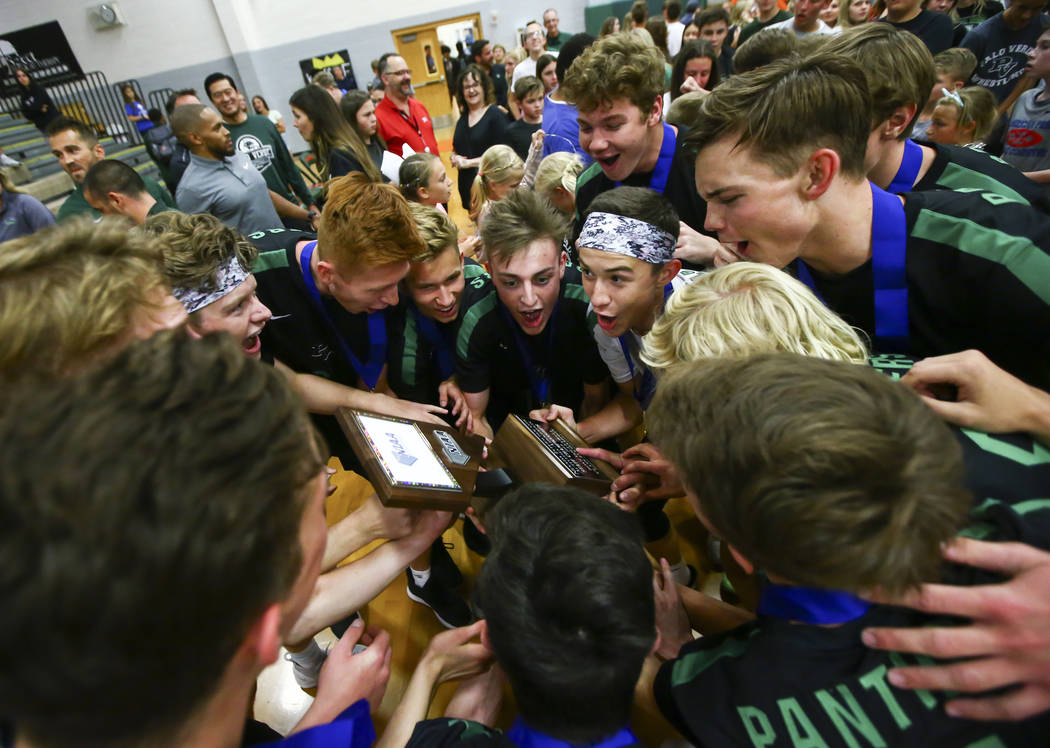 Palo Verde players celebrate their victory over Coronado in the Class 4A state volleyball champ ...