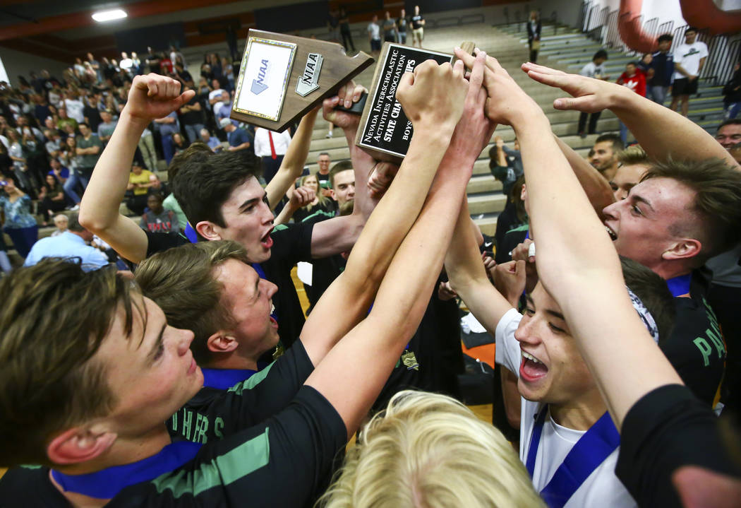 Palo Verde players celebrate their victory over Coronado in the Class 4A state volleyball champ ...
