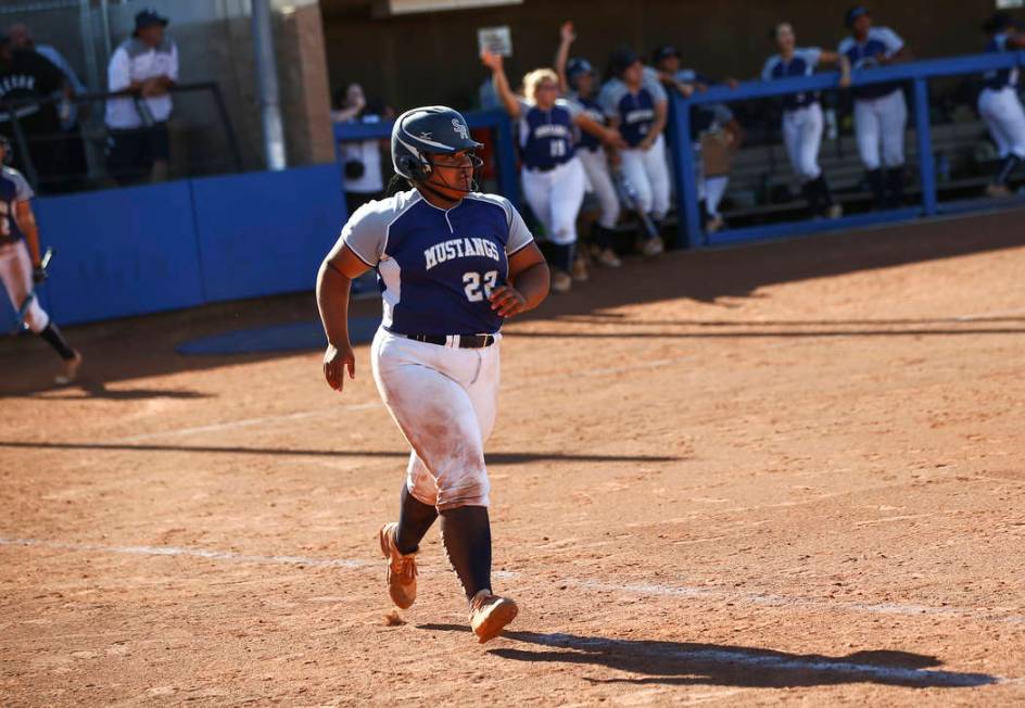 Shadow Ridge's Alyssa Stanley (22) rounds the bases on her home run hit against McQueen during ...