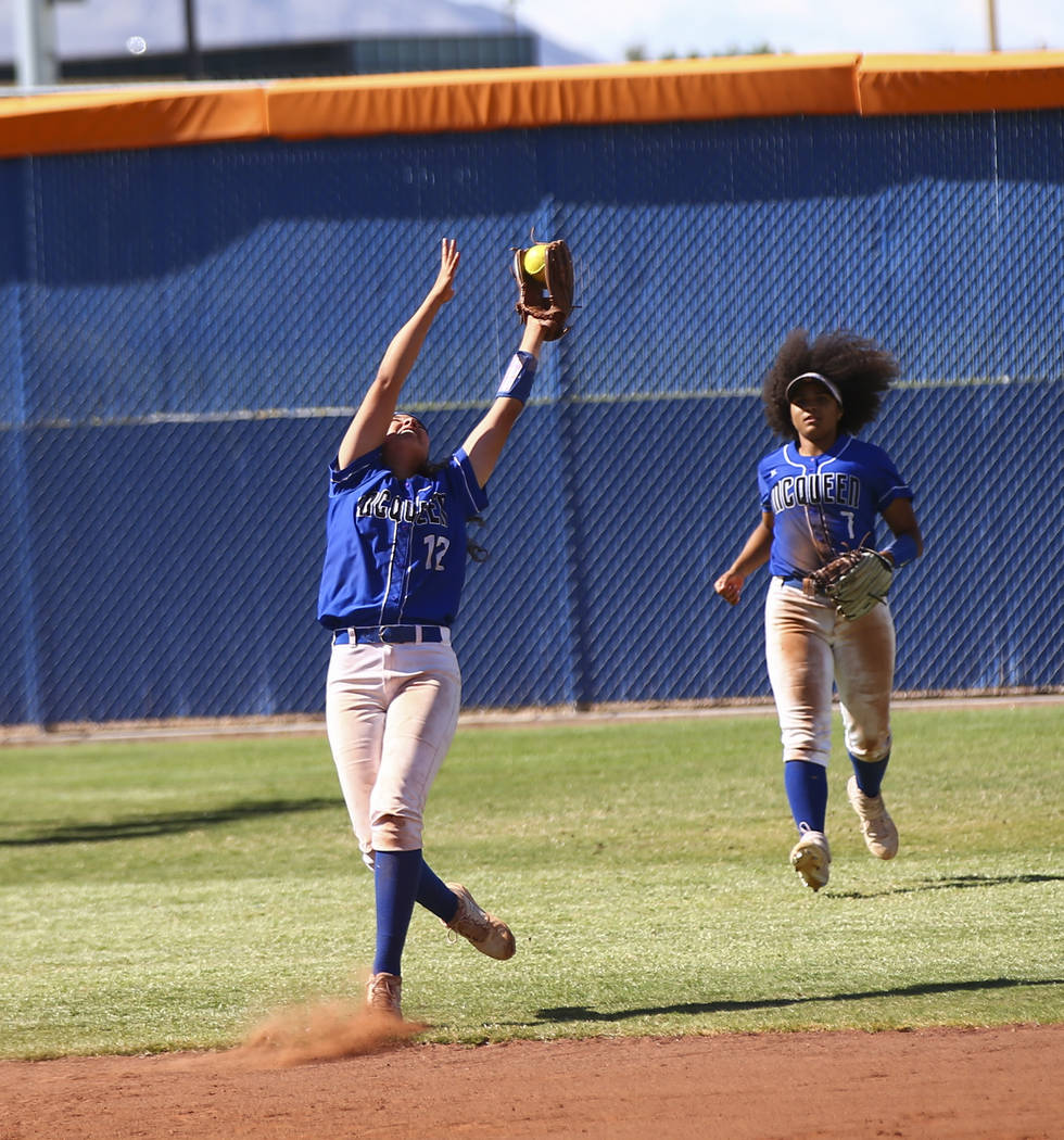 McQueen's Kiera Escalante (12) catches a fly ball from Shadow Ridge's Shea Clements, not pictur ...