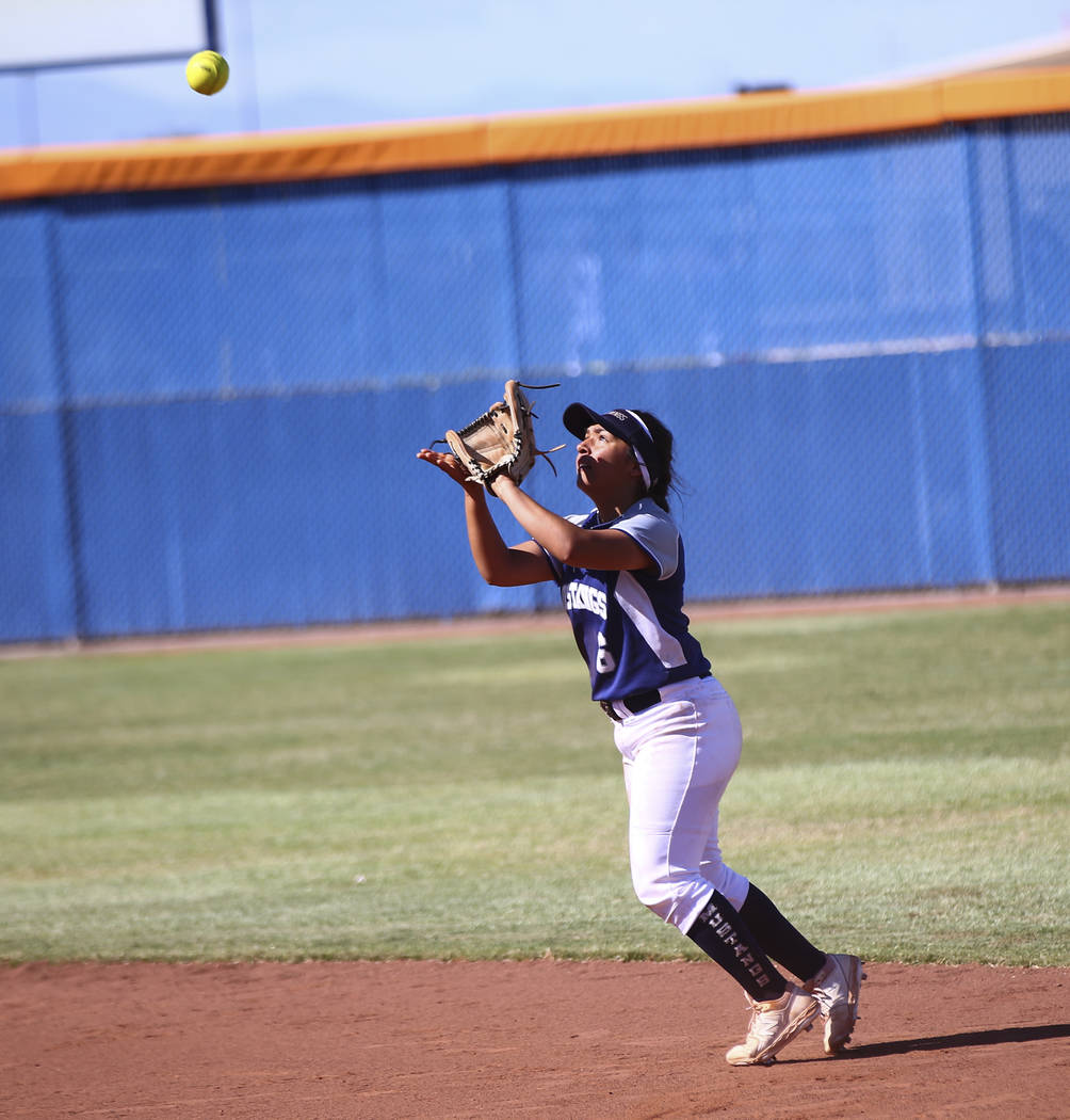 Shadow Ridge's Angelina Esqueda (6) catches a fly ball from McQueen's Kiera Escalante (12) duri ...