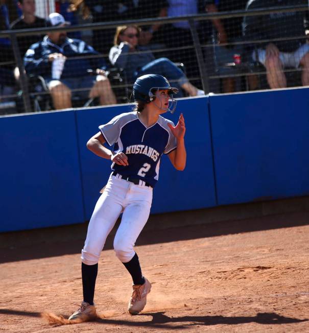 Shadow Ridge's Jasmine Payne (2) scores a run against McQueen during the second round of the Cl ...