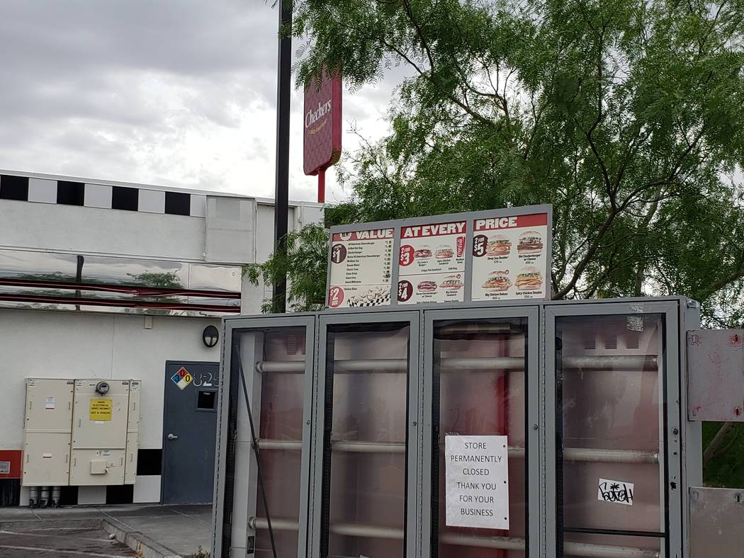 A sign on the drive-thru board of a Checkers restaurant on Rancho Drive near U.S. Highway 95, a ...