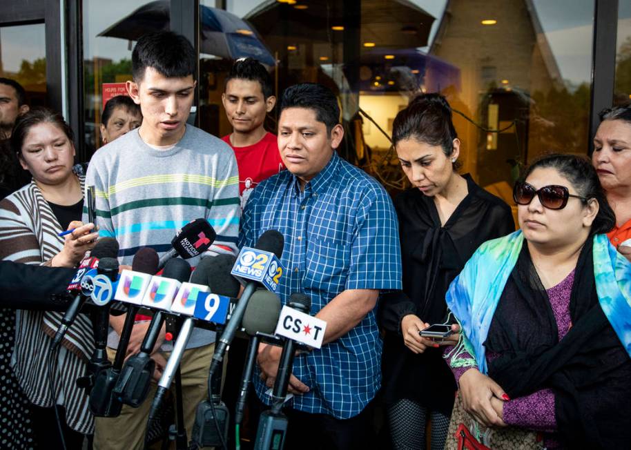 Surrounded by family members and supporters, Marlen Ochoa-Lopez's father, Arnulfo Ochoa, talks ...