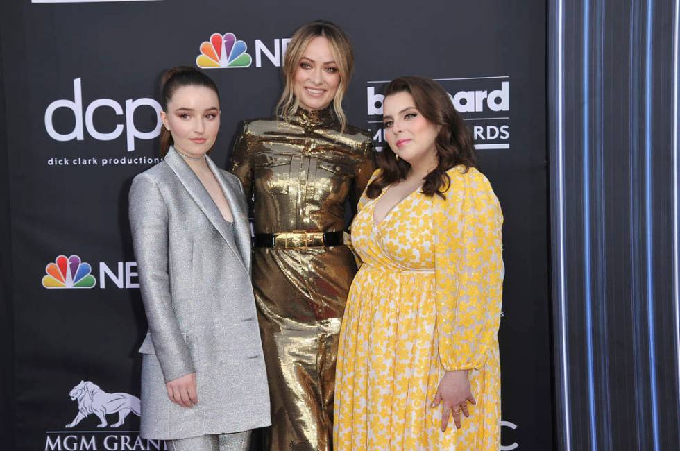 Kaitlyn Dever, left, Olivia Wilde, Beanie Feldstein arrive at the Billboard Music Awards on May ...