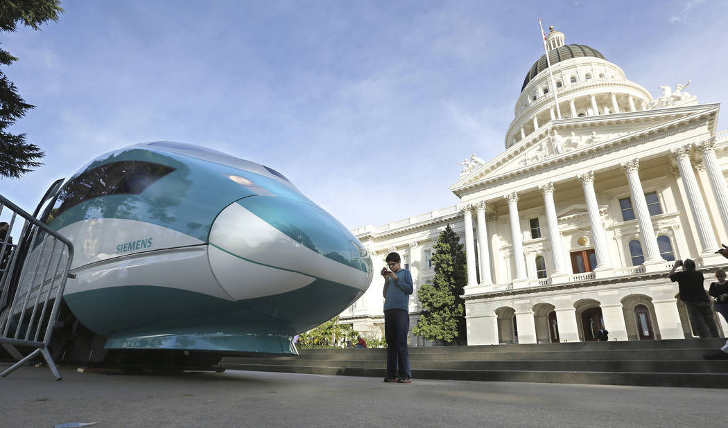 FILE - In this Feb. 26, 2015, file photo, a full-scale mock-up of a high-speed train is display ...
