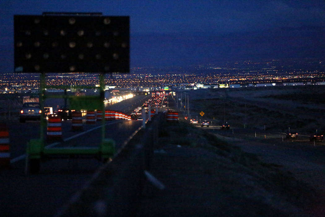 In the predawn hours attendees of the Electric Daisy Carnival begin heading south on Interstate ...