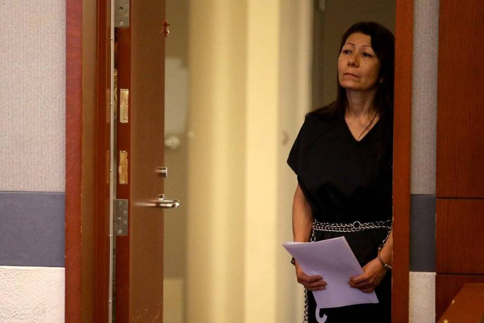 Retired Las Vegas police Detective Pamela Bordeaux remains in a holding cell entrance outside t ...