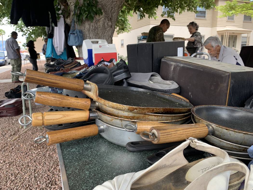 Residents of Desert Plaza Senior Apartments hold a yard sale to raise money for Serge Fournier' ...