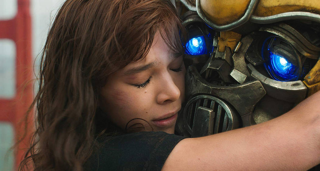 This image released by Paramount Pictures shows Hailee Steinfeld as Charlie and Bumblebee in a ...