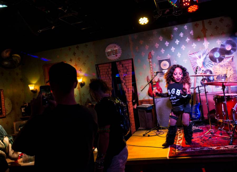 A performer dances at the punk-themed Mini Bar in Downtown EDC during the second day of the Ele ...