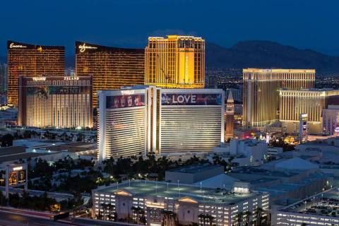The Las Vegas Strip skyline lights up at dusk as seen from the VooDoo Lounge atop the Rio. (Las ...