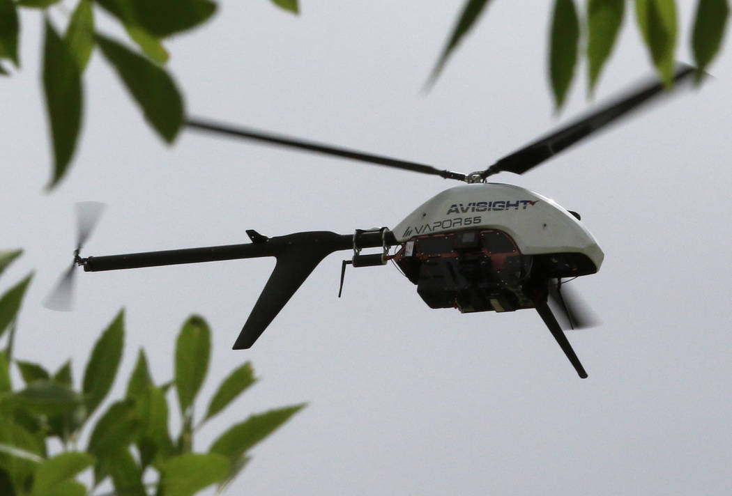 The Vapor 55 unmanned helicopter flies over Craig Ranch Park on Friday, May 17, 2019, as drone ...